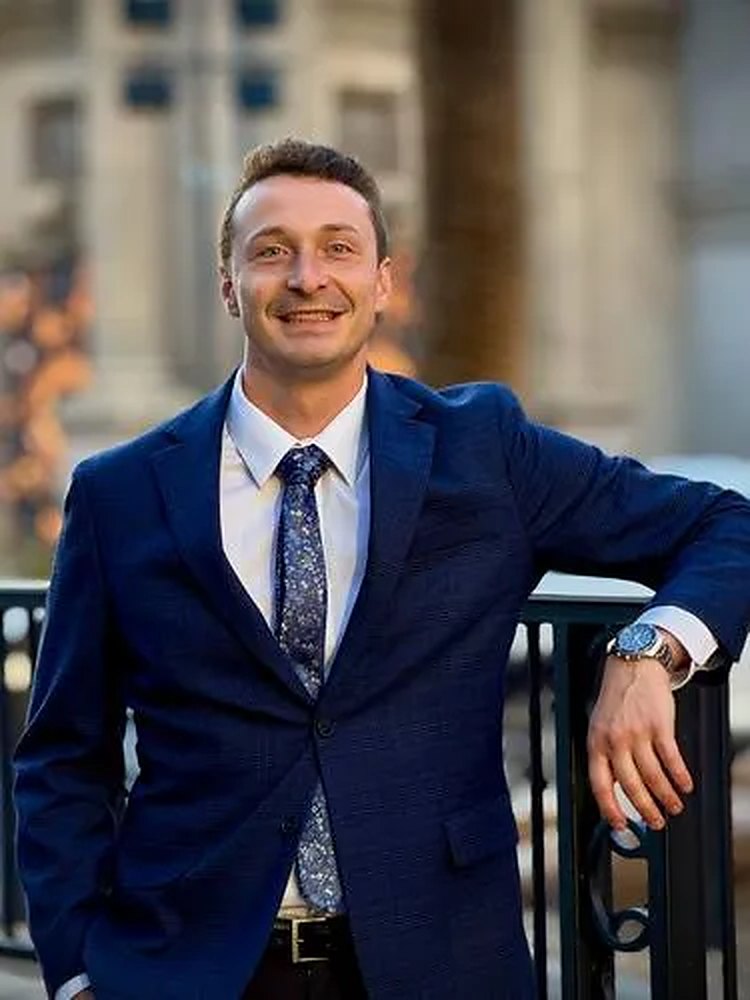 Caleb Bullard, founder of Bullard Financial, in a navy suit